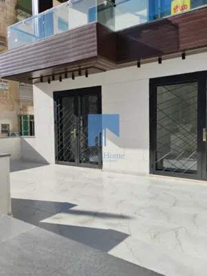 شقة أرضية فاخرة للبيع في الجاردنز - خلف ابن الهيثم 145م مع ترسات 50م تشطيب سوبر ديلوكس لم تسكن