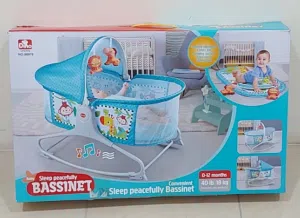 Baby sleeping peacefully bassinet