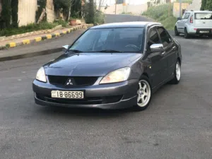 ميستوبيشي لانسر للبيع 2009 بحالة الوكالة