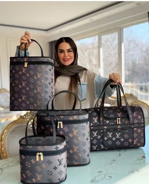 Louis Vuitton . Travel Bags . Black0
