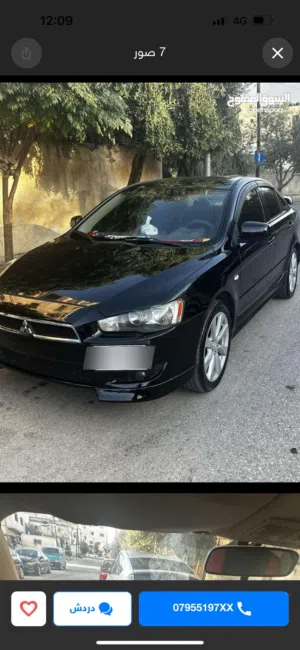 سيارة ميتسوبيشي لانسر 2010 موديل GLX لون أسود بحالة ممتازة للبيع