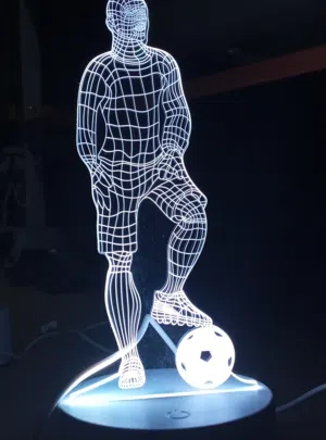 إضاءة شكل لاعب كرة قدم