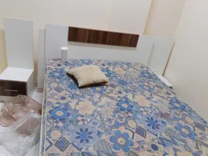 Queen size bed with 2 mattress side tables and dressing table Ikea drawer and 4 door mini cupboard