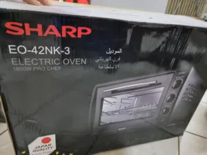فرن مع سخان طعام كهربائي