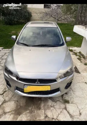 متسوبيشي لانسرEX لون شامبين مالك واحد وارد الوكاله الاردنيه عداد اصلي 40 الف كوشوك الشركه الاصلي