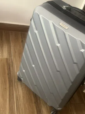 شنطة سفر لون رمادي