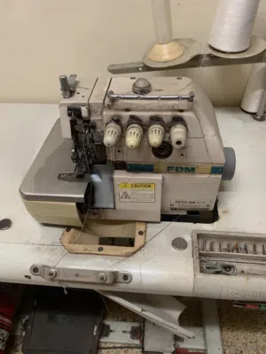 مكنة خياطة اوفر