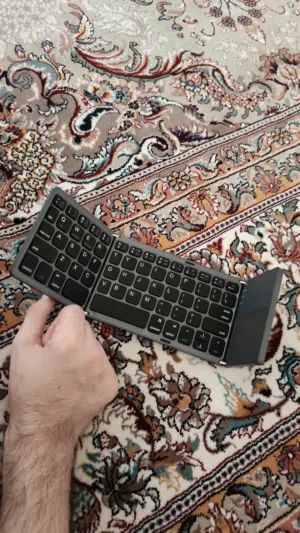 B033 Messenger Bluetooth Foldable Keyboard - 2 months old, like new with charger