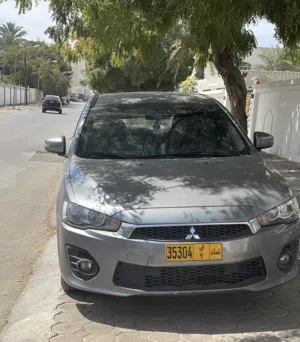 ميتسوبيشي لانسر 2016 EX بمحرك 2.0 قوي وممشى قليل  بحالة ممتازة جداً
