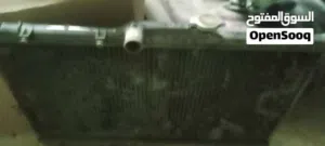 مروحة رديتر بالإضافة الى رديتر تويوتا كرولا 96 بحالة جيدة بسعر حرق