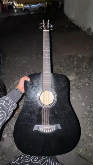 38-inch acoustic guitar with a matte end