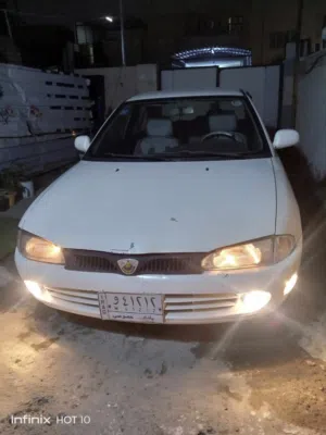 سيارة بروتون 2004 لون ابيض نضيفة