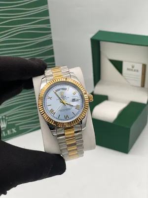 Rolex . Analog Quartz . Gold4