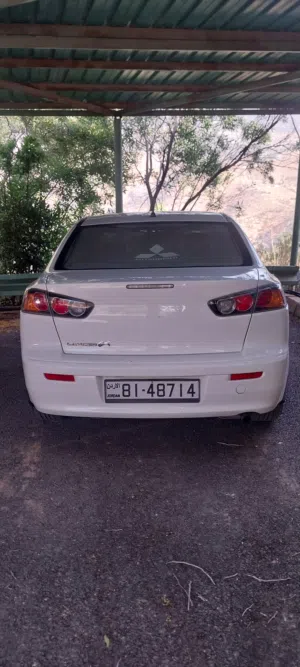 متسوبيشي لانسر اعفاء طبي نضيفه جدا فحص كامل