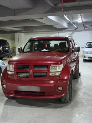 دودج نيترو 2013 SXT نظام أوتوماتيك لون أحمر بحالة ممتازة