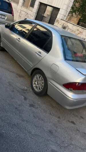 ميتسوبيشي لانسر 2002