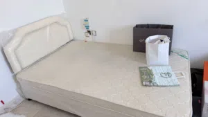 Used bed for 1 month only, excellent condition/سرير مستعمل بحالة الزيرو يدوي الصنع بكومود جانبي يحتو