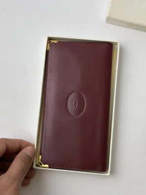 محفظة كارتير مُخزنه كالجديد .