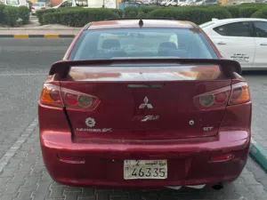 مطلوب ميتسوبيشي لانسر 2008 موديل GLX بحالة جيدة مع حساسات خلفية وزجاج كهربائي
