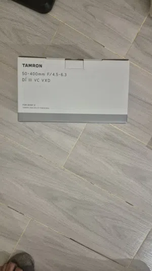 عدسه من Tamron  جديد
