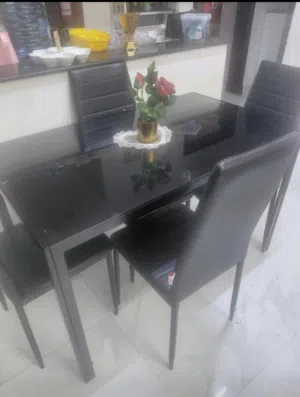 urgent sale new dining table with 4 chairs