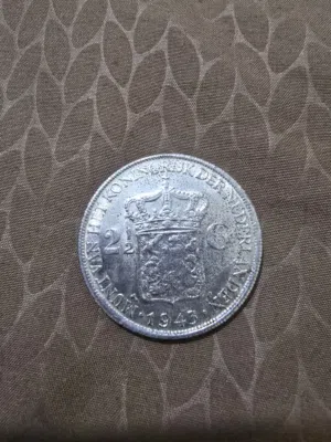 عملا هولنديه نص غولدن فضه 25 غرام سك سنه 1943
