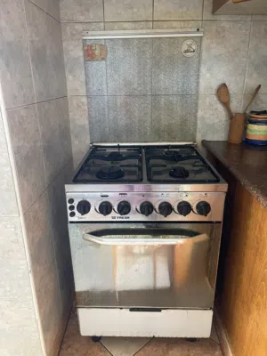 غاز طباخ مع فرن + طاولة مطبخ