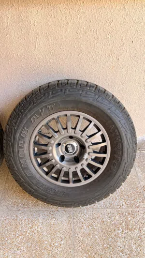 265/70/17  Ecolander A/T حجرية    موديل 2025مستخدمات شهر  فيهن ضمان سنتين    مطلوب 140 ريال
