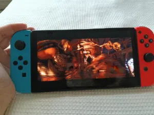 Nintendo switch console with 4 games