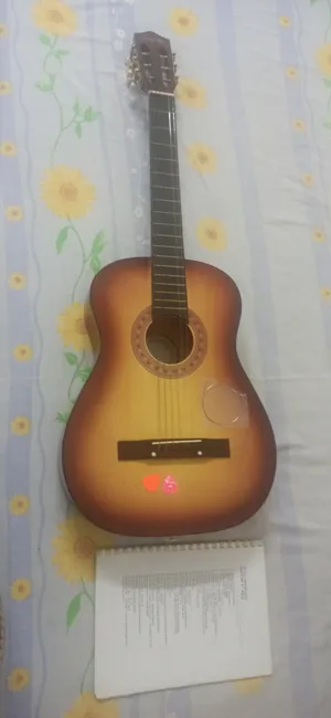 Guitar with cover - Hardly used in good condition