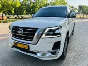 نيسان باترول 2020 V6 بلاتينيوم رقم واحد فل الفل ابيض على زعفراني خليجي صيانة الحشار