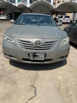 2008 Toyota Camry GLX Hybrid Coupe in Slate Gray with Panoramic Sunroof and Modern Features