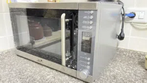 مايكرويف كهربائي ماركة FRIGAIRE امريكي لون سيليفر