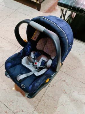 كرسي هزاز وكرسي سيارة كوت بيبي نوع شيكو Chico car seats