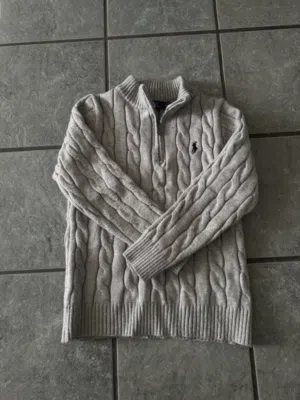 Polo Ralph Lauren sweaters One is in beige and the other is in navy blue. 25Kd for both