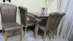 ميز طعام مرمر بني اللون للبيع