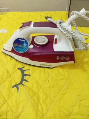 مكواة جيدة وجديدة