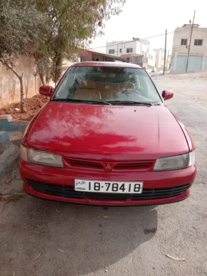 ميتسوبيشي لانسر لون خمري