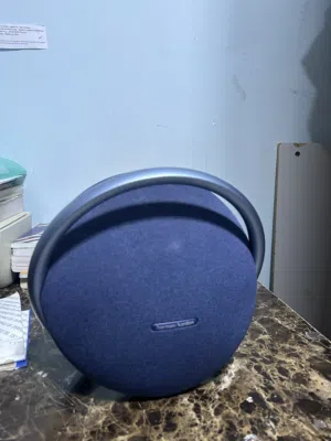 Harman Kardon Onyx Studio 7 Bluetooth portable speaker in blue.
