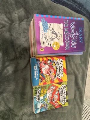 13 wimpy kid books,2 captain underpants books