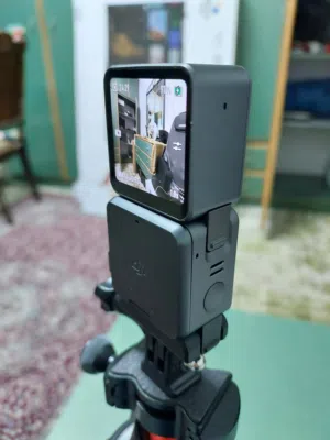 كاميرا DJI Action 2 Dual-Screen Combo بحالة ممتازة مع ستاند احترافي