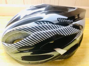 White sports helmet and 2 elbow pads for sale in good condition! slightly used.