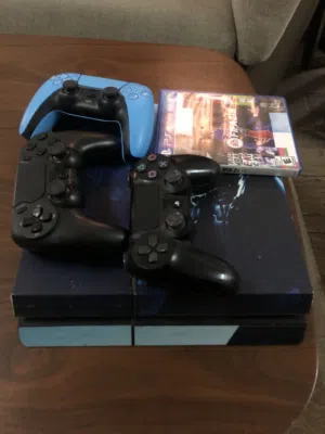PlayStation 4 with games and 3 controllers bought in 2022 in great condition