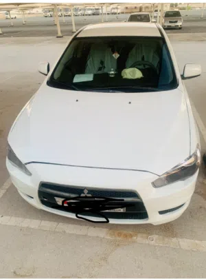 Mitsubishi lancer 2009 for excellent condition ac engine everything perfect