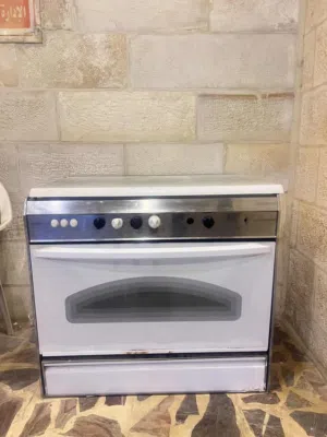 غاز طبخ 5 عيون90 سانتي  + فرن – ستانلس ستيل – مستعمل بحالة ممتاز