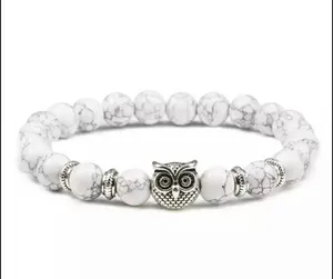 White and owl bracelets
