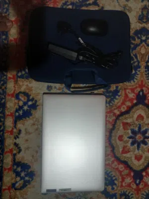 Silver LENOVO Laptop with mouse and bag