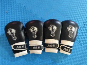 زوجين كفوف ملاكمة قياس 12oz للبيع كلهن ب 30 الف قفل  ماركة AG  DRAGONDO IRAQ وماكو توصيل البنوك شارع