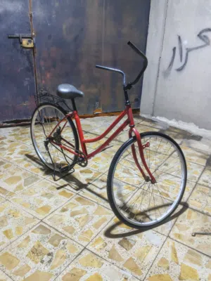 السلام عليكم بايسكل سياحي لون احمر حجم 27 للبيع او المراوس