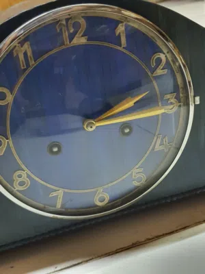 Antique German Deco style table mantel clock in oak wood from 1930